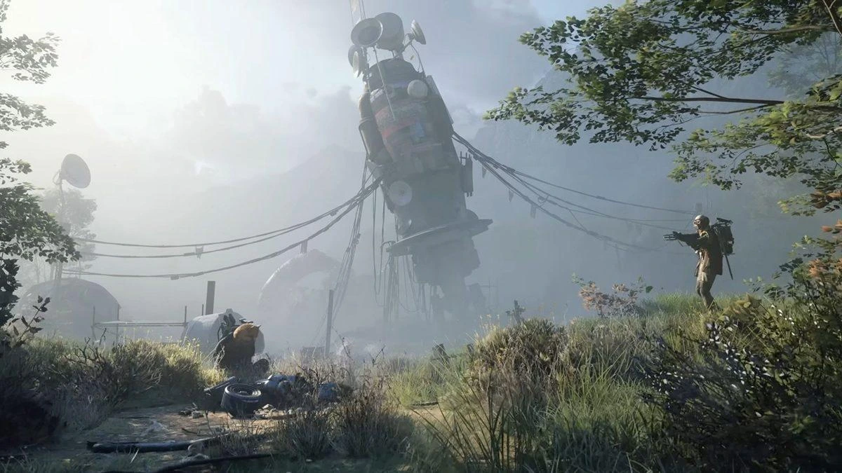 Arc Raiders’ta açık arazide büyük bir yapının çevresinde iki karakter