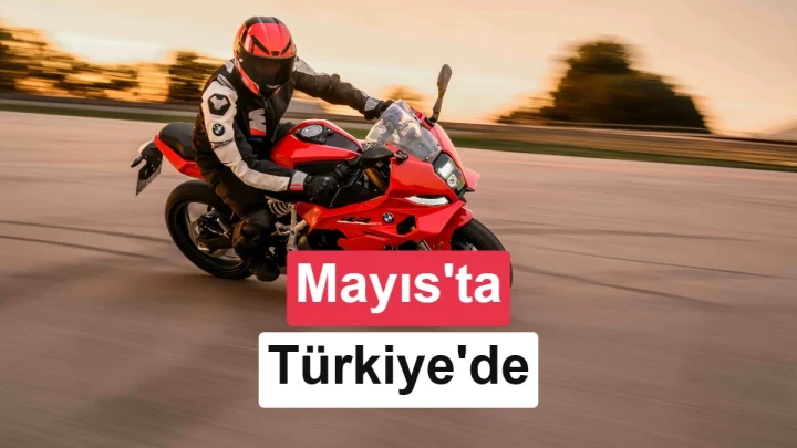 Kırmızı BMW F 450 RR motosiklet üzerinde pistte ilerleyen sürücü; görselde Türkiye satışının mayıs ayında başlayacağı belirtiliyor