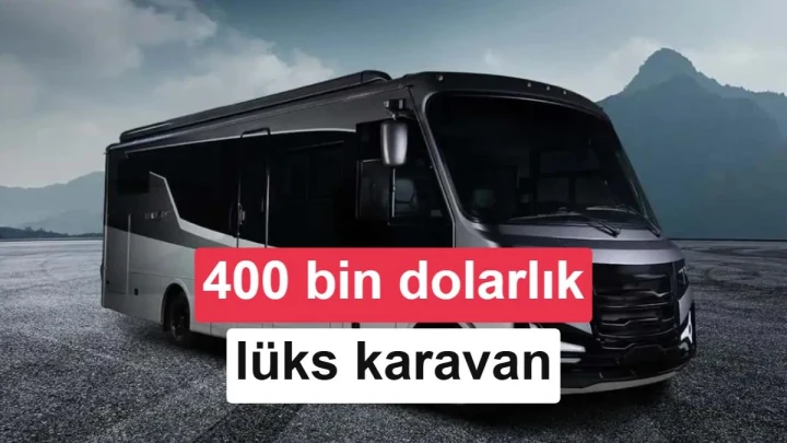 Dağlık bir göl kıyısında duran Embark elektrikli karavan