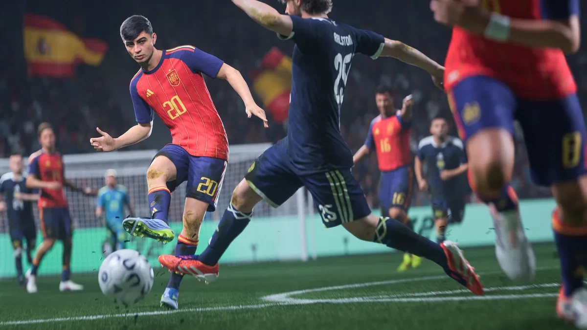 FC 27 futbol oyununda İspanya forması giyen oyuncu top sürüyor