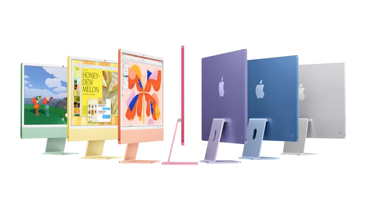 Farklı renk seçenekleriyle gösterilen Apple iMac bilgisayarlar