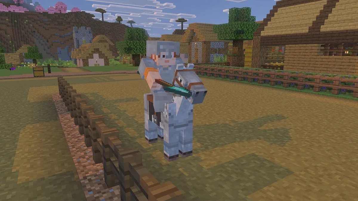 Minecraft’ta zırhlı iki oyuncu bir mızrakla karşı karşıya duruyor