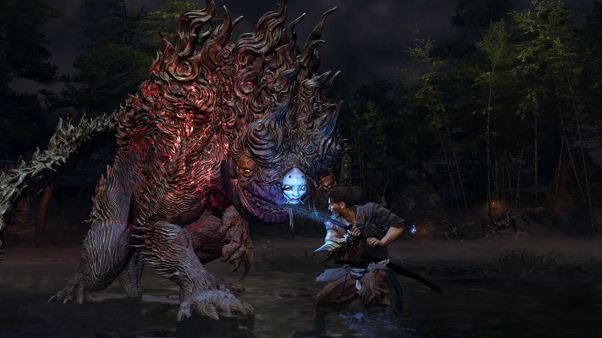 Onimusha: Way of the Sword’da bir savaşçı, büyük ve yaratık benzeri bir düşmanla karşı karşıya