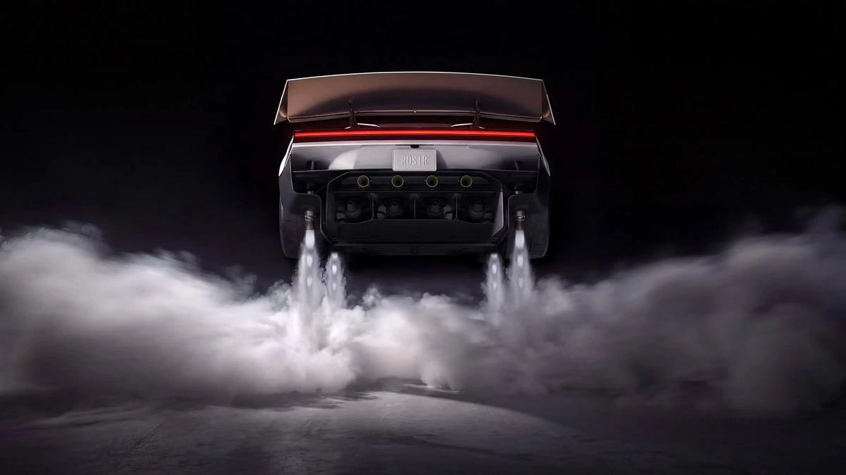 Tesla Roadster’ın arka kısmındaki iticilerden gaz çıkarken havalanma görüntüsü