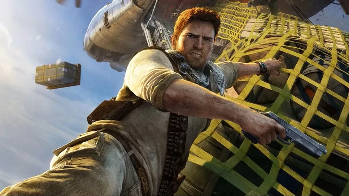 Uncharted oyununda Nathan Drake, havadaki bir yükün üzerinde mücadele ediyor